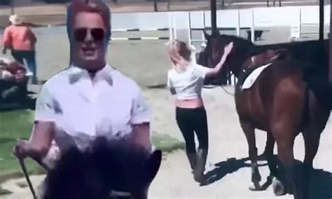 Britney Spears rides horse completely topless but says she。